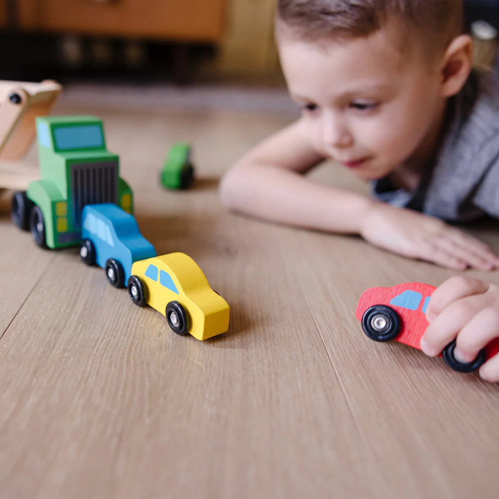 Melissa & Doug Wooden Car Carrier Playset with 1 Truck and 4 Cars - Image 7